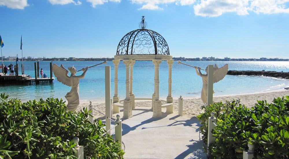 Overblown? Tacky? Surely not! Sandals wedding gazebo on the Island, with the mainland on the horizon.