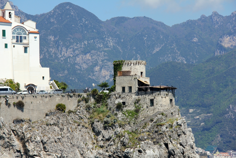 The Amalfi Coast is littered with watch-towers like this one, reflecting a history of piracy and banditry. Most have been transformed into houses,
        bars, restaurants or nightclubs.
