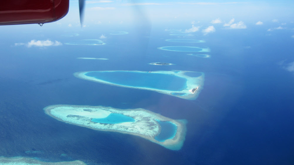 On the seaplane flight to Athuruga.  The edge of Ari Atoll stretches off into the distance.