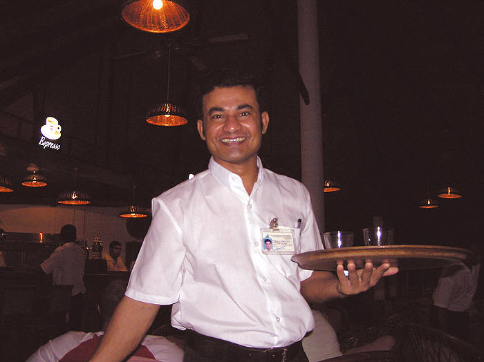 "Our" waiter in the main bar only got to go home to Bangladesh once every two years. (42k)
