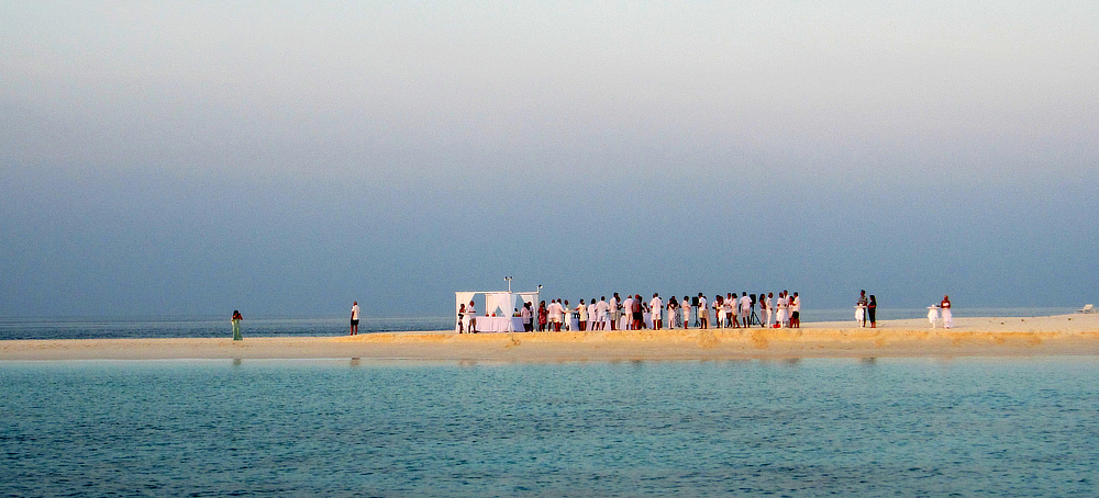 The weekly Manager's Sunset cocktail party in the sandbar area.