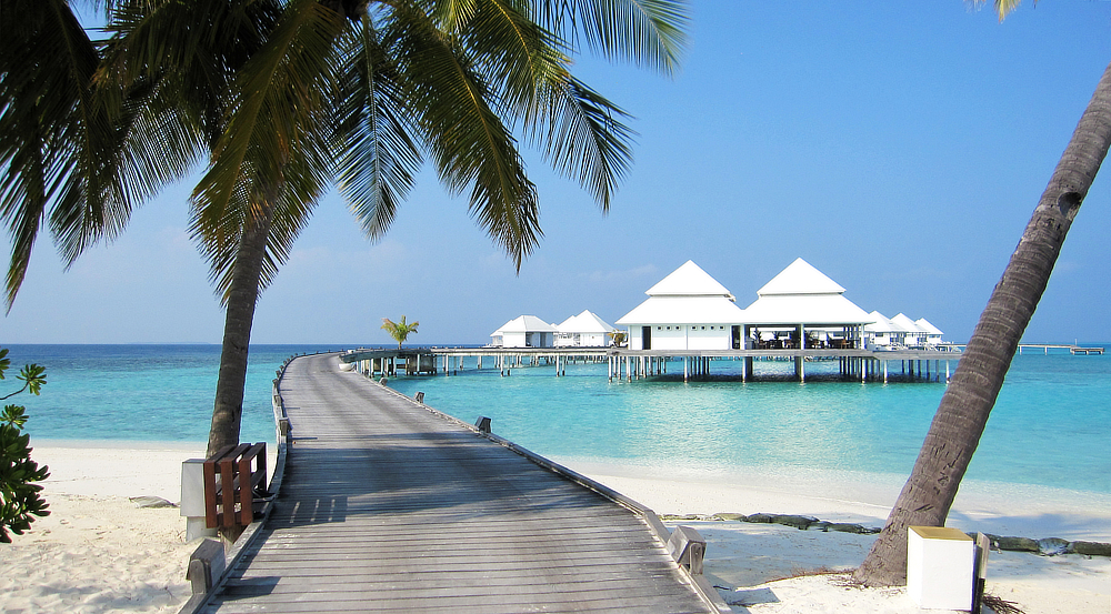 The Water Villas jetty out to the over-water bar and restaurant.