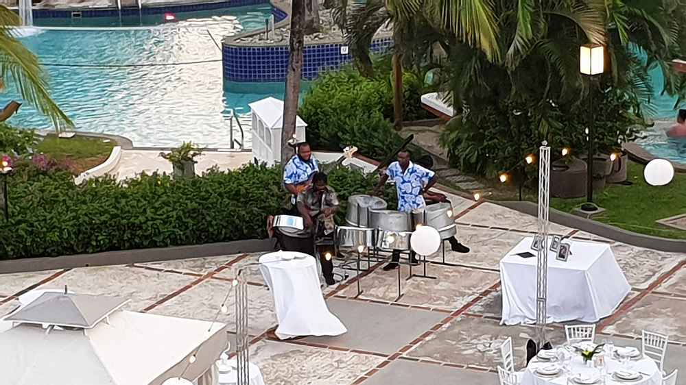 A steel band sets up for the wedding reception.